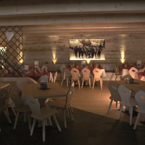 Sala pranzo con rivestimento in Legno Vecchio e parti in ferro. Pavimento in pietra. 